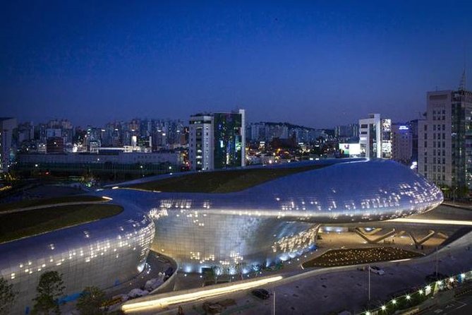 Custom Tour: Best Night View of Seoul - Dongdaemun Design Plaza by night: modern architecture from the road