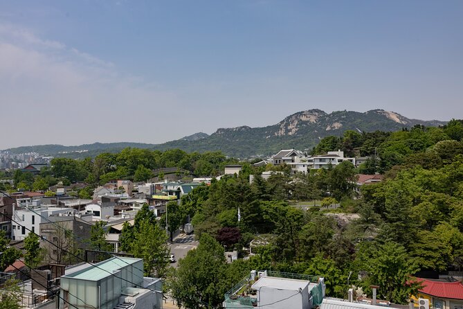 Gwanghwamun Tour l 120 minutes to Understand Local Korean Society - Bukchon Hanok Village, preservation pressures you can feel