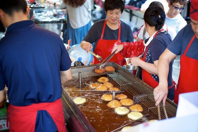 Heart of Seoul - Stop 4: Myeongdong Shopping Street for Street Snacks and People-Watching