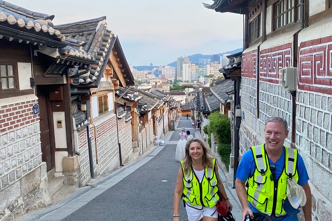 Market Food Tour & Evening E-bike Ride in Seoul - Bukchon Hanok Village: famous views plus quieter angles