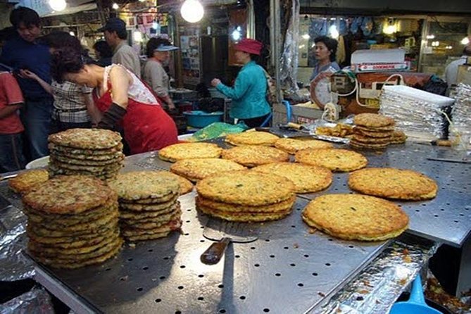 Private K-Food Walking Tour Including Visit to Dongdaemun District - Cheonggyecheon stream, your city break without leaving downtown