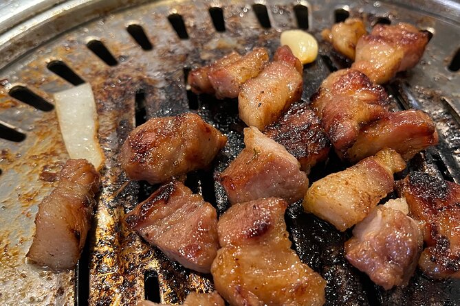 Seoul Food n Night view with Local Korean BBQ dinner Hongdae st. - How the full-day option adds history and a performance