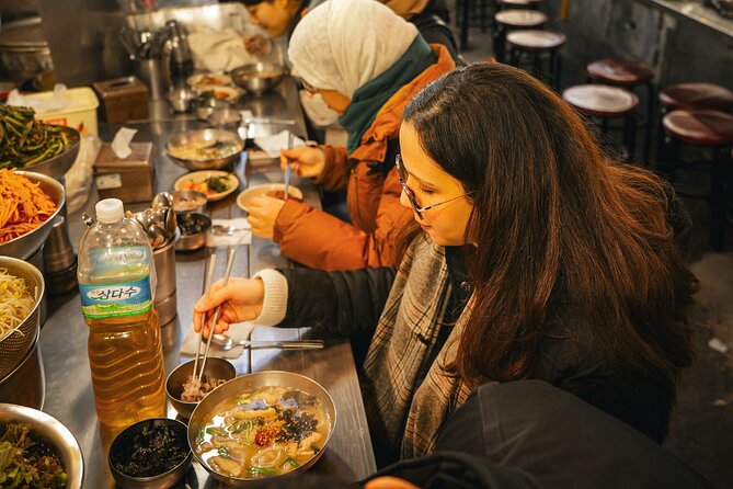 Seoul History Tour: Dark Past & Market Street Flavors - A dark start, then palace views, then street food