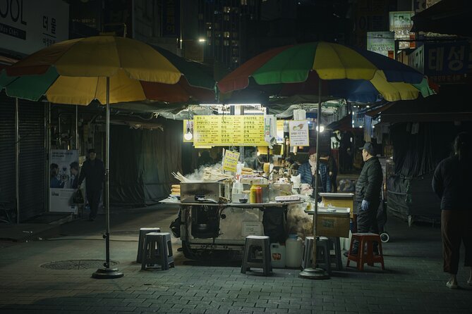 Seoul History Tour: Dark Past & Market Street Flavors - Sungnyemun Gate and Seoul City Hall area: the power shift you can see