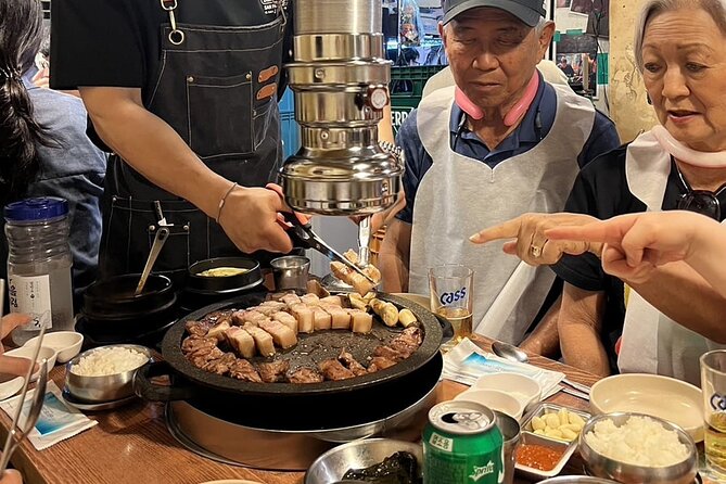 Seoul Korean BBQ Dinner Experience with Secret Food Tours - The Center-Table Korean BBQ Setup You’ll Be Cooking At