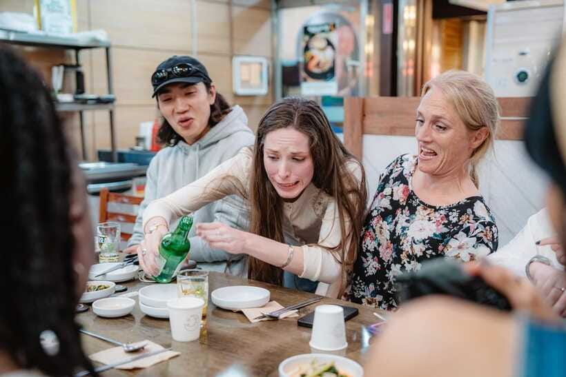 Seoul: Night Market Food Tour with Local Guide - Skip the line through express security check, and why it matters