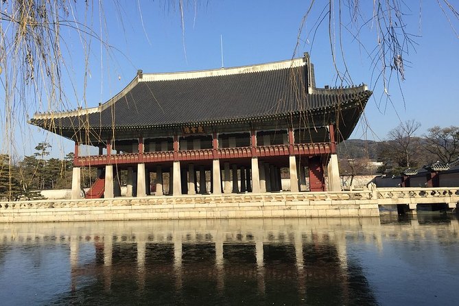 Small-Group Royal Palace and Seoul City Tour (hotel pick-up) - Blue House photo stop and the Mt Bukak backdrop
